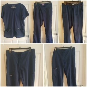 4 pairs of Navy Blue scrub pants and 1 top.